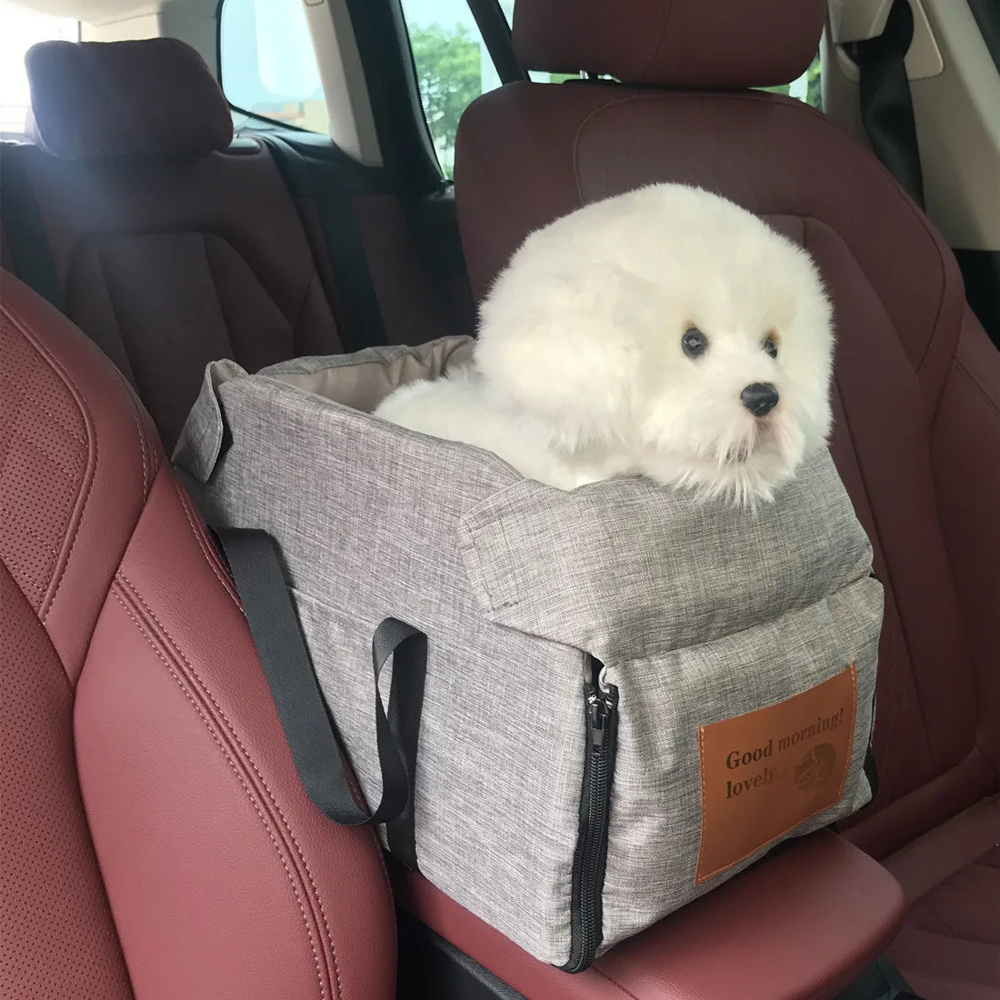 Small dog riding in the Quorix Co-Pilot Console Seat