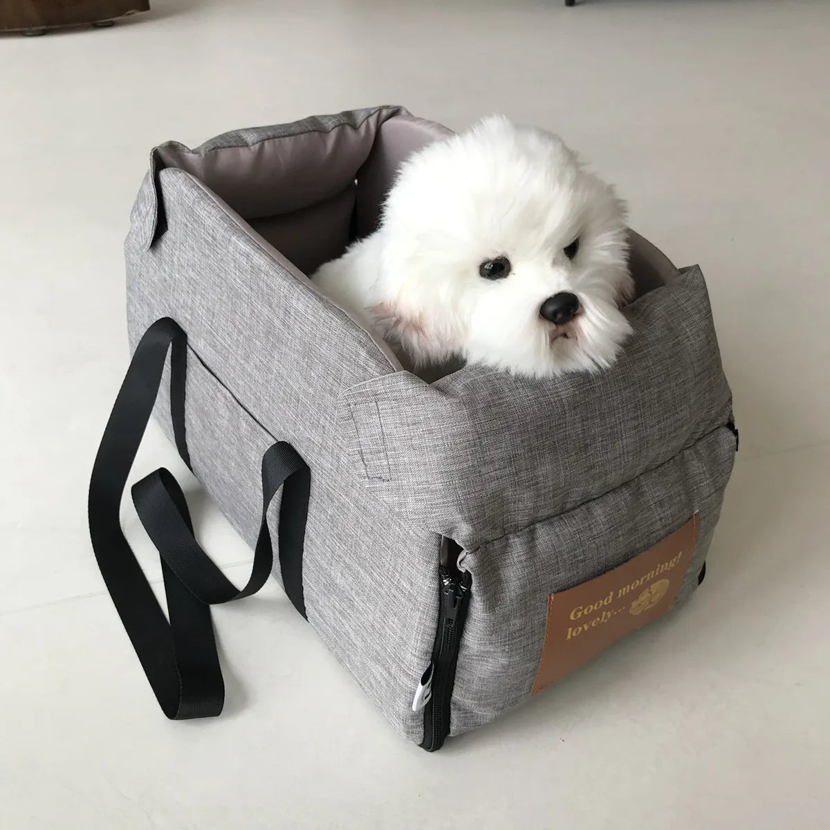 Gray console seat with a small dog