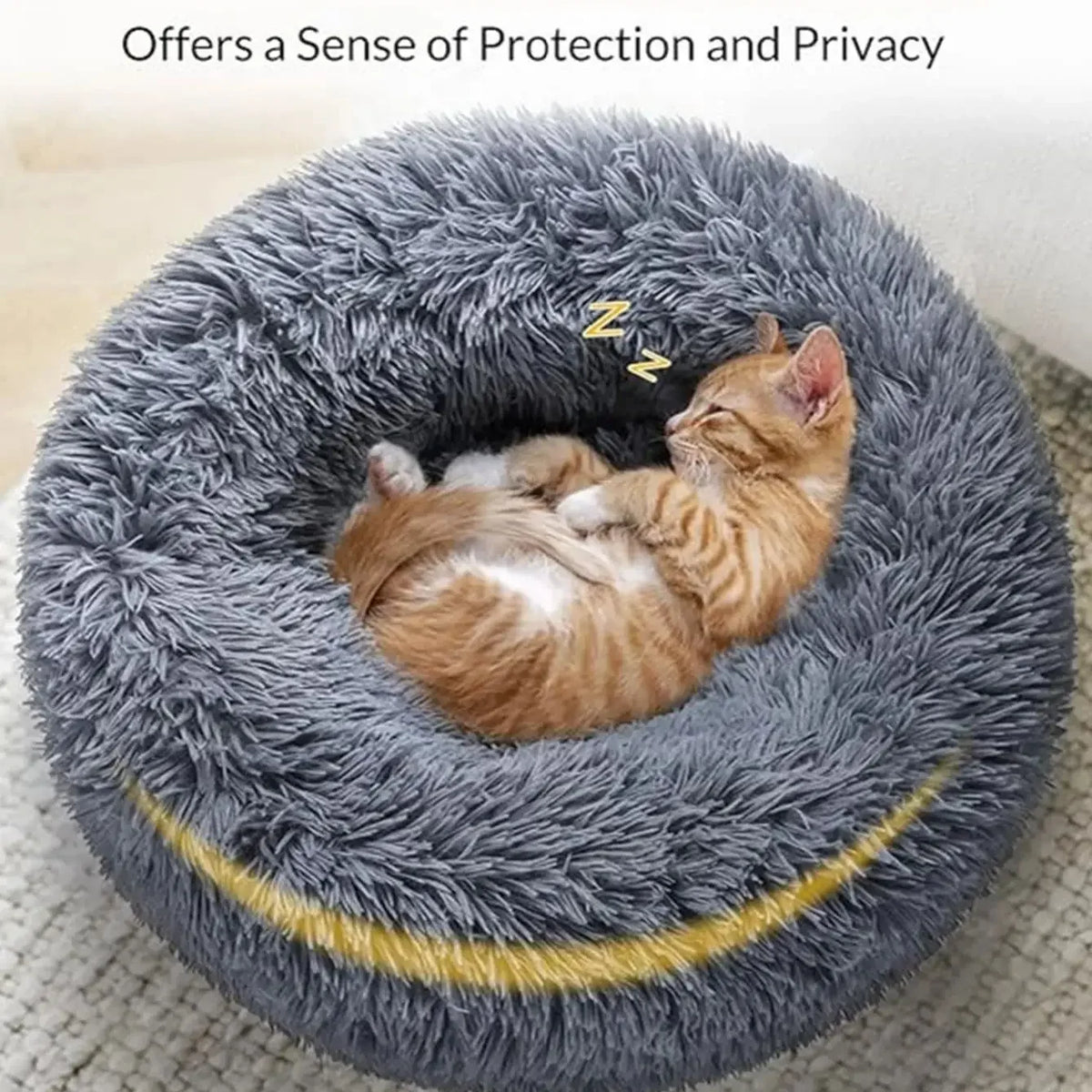 Cat sleeping in the plush donut bed